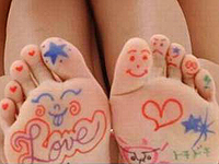 Painted bottoms of feet.